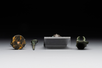A varied collection of four bronze objects and figures, Roman Empire, 8th C. B.C./3rd C.