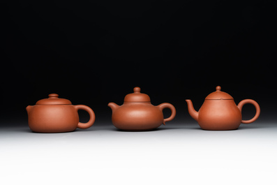 A collection of 20 Chinese Yixing stoneware teapots, 20th C.