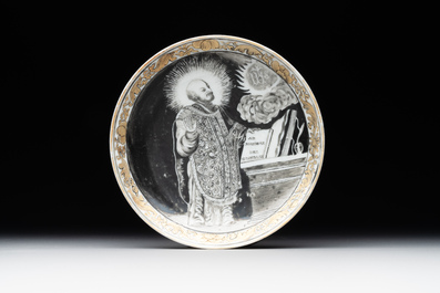 A rare Chinese grisaille and gilt cup and saucer with Ignatius of Loyola, Qianlong