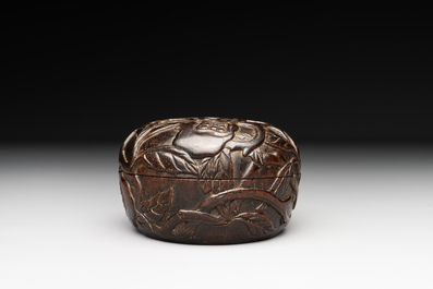 A Chinese huanghuali wooden box and cover with pomegranate design, 17/18th C.