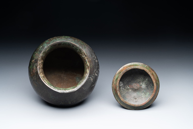 Two Chinese archaic bronze food vessels, 'ding 鼎', Han
