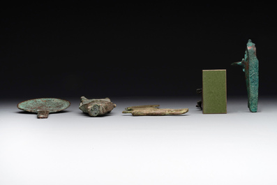 A varied collection of five bronze figures and utensils, Egypt, 3rd/1st C. B.C.