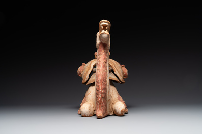 A pair of Chinese polychrome-painted terracotta camels with saddles, Tang