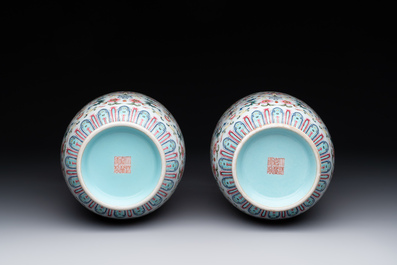 A pair of Chinese famille rose vases with floral design, Jiaqing mark, 19/20th C.