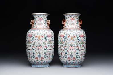 A pair of Chinese famille rose vases with floral design, Jiaqing mark, 19/20th C.