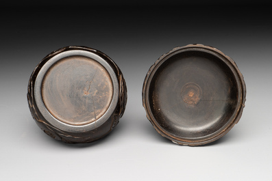A Chinese huanghuali wooden box and cover with pomegranate design, 17/18th C.
