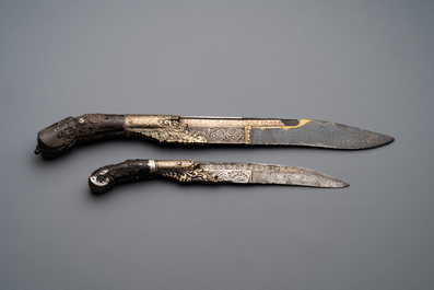 A varied collection of four decorated daggers, two inset with red coral and turquoise, Sri Lanka and Georgia, 18/19th C.