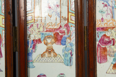 A Chinese four-part folding screen with famille rose plaques, 19th C.