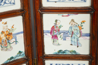 A Chinese four-part folding screen with famille rose plaques, 19th C.
