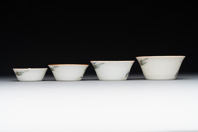 A rare set of eight Chinese famille rose 'Sanxing' nesting bowls, Tongzhi mark and of the period