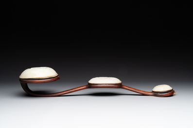 A Chinese wooden ruyi with white jade and a pair of table screens with jade, 19th C.