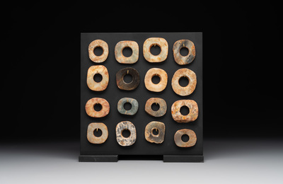 A collection of 16 Chinese neolithic jade 'bi' discs, probably Shang