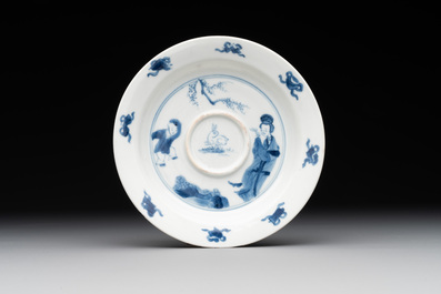 A Chinese blue and white 'Long Eliza and playing boy' cup and saucer, Qi Yu Mei Zhi 奇玉美製 and Bi Yu Tang Zhi 璧玉堂製, Kangxi
