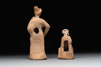 Two terracotta female figures and two fragments with figural design, Italy, 7/4th C. B.C.