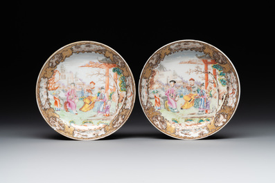 A Chinese Canton famille rose 'mandarin subject' covered teapot and a pair of saucers, Qianlong