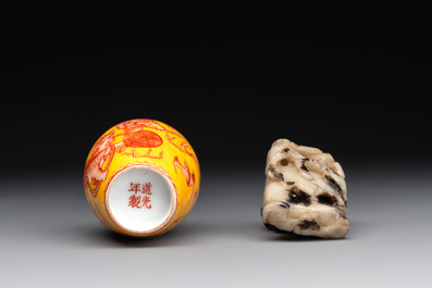 A Chinese jade snuff bottle and a yellow-ground iron-red snuff bottle, Daoguang mark, 19th C.
