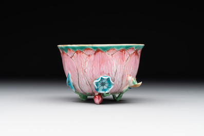 A Chinese famille rose relief-decorated 'lotus' cup and saucer, Yongzheng