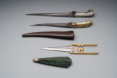 A collection of three daggers decorated with jade, silver and gold and an Indian mogul sword, India, 17/19th C.