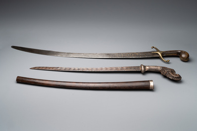 A silver plated dagger and four swords, China, Burma and Indonesia, 18/19th C.