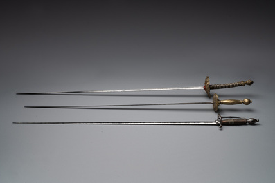 A varied collection of 4 European swords and a walking stick-blade, 17/19th C.