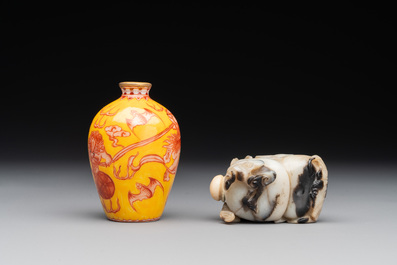 A Chinese jade snuff bottle and a yellow-ground iron-red snuff bottle, Daoguang mark, 19th C.