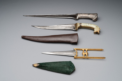 A collection of three daggers decorated with jade, silver and gold and an Indian mogul sword, India, 17/19th C.