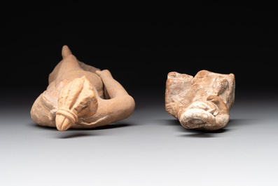 Two terracotta female figures and two fragments with figural design, Italy, 7/4th C. B.C.