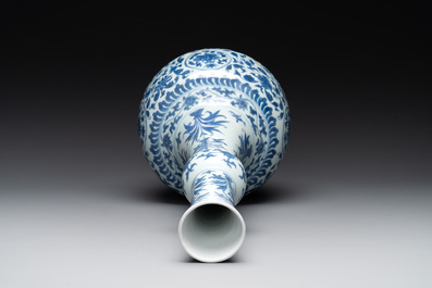 A Chinese blue and white 'lotus scroll' bottle vase, Transitional period