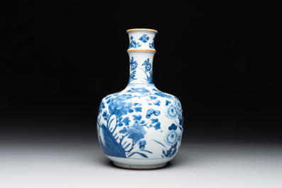 A Chinese blue and white bottle-shaped huqqa base with floral design for the Islamic market, Kangxi