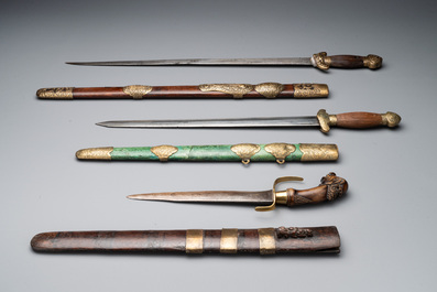 A silver plated dagger and four swords, China, Burma and Indonesia, 18/19th C.
