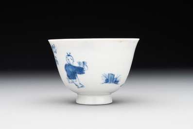 A Chinese blue and white 'Long Eliza and playing boy' cup and saucer, Qi Yu Mei Zhi 奇玉美製 and Bi Yu Tang Zhi 璧玉堂製, Kangxi