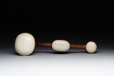 A Chinese wooden ruyi with white jade and a pair of table screens with jade, 19th C.