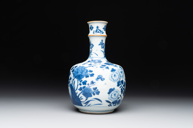 A Chinese blue and white bottle-shaped huqqa base with floral design for the Islamic market, Kangxi