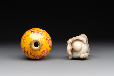 A Chinese jade snuff bottle and a yellow-ground iron-red snuff bottle, Daoguang mark, 19th C.