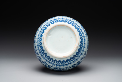 A Chinese blue and white 'lotus scroll' bottle vase, Transitional period