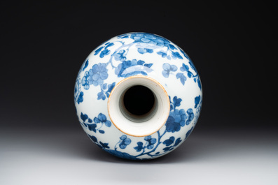 A Chinese blue and white bottle-shaped huqqa base with floral design for the Islamic market, Kangxi