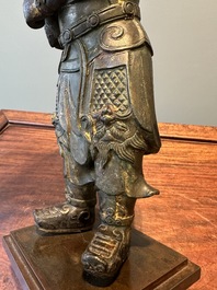 A fine Chinese gilt bronze figure of Zhou Cang 周倉, Ming