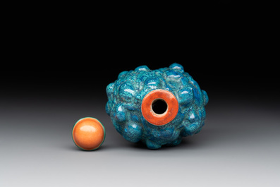 A rare Chinese robin's-egg-glazed moulded '18 Luohan' snuff bottle, 19th C.