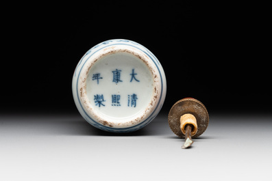 A Chinese blue, white and copper-red snuff bottle, Kangxi mark, 19th C.
