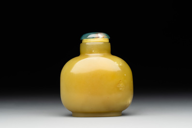A Chinese yellow jade snuff bottle with moss agate cover and bone stopper, 19th C.