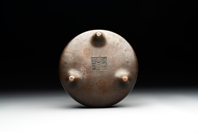 A Chinese bronze tripod censer, Guan Huai Tang Zhu Ren 冠槐堂主人 mark, 17/18th C.