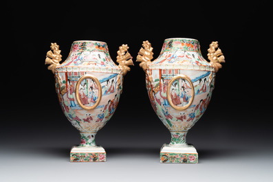 A rare pair of Chinese Canton famille rose export urns, 19th C.