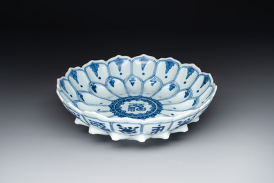 A rare Chinese lotus-shaped blue and white 'fu' dish, Kangxi mark and of the period