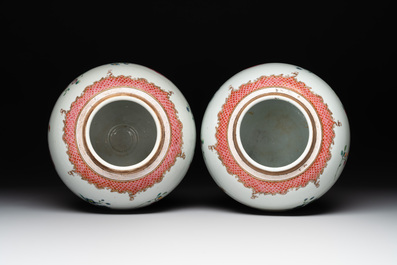 A pair of fine Chinese famille rose 'botanical Merian-style' jars with wooden covers, Qianlong