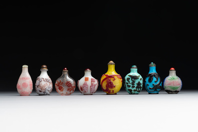 Eight Chinese Peking glass snuff bottles, Qianlong mark, 19/20th C.