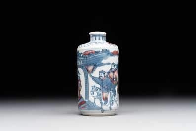 A Chinese blue, white and copper-red snuff bottle, Yongzheng mark, 19th C.