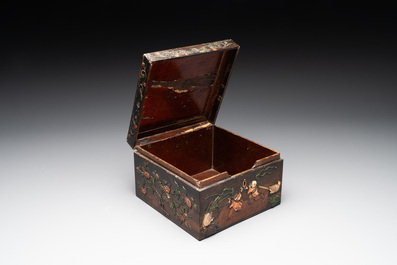A square Chinese embellished and lacquered wooden box depicting a musician and two boys, Qing