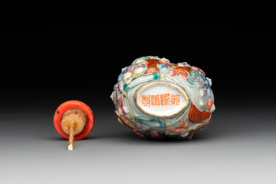 A Chinese famille rose moulded snuff bottle, Qianlong mark, late 18th/early 19th C.