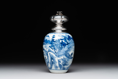 A Chinese blue and white silver mounted tea caddy with a river landscape, Kangxi