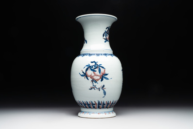 A Chinese blue, white and copper-red 'Three abundances' or 'Sanduo' vase, 19/20th C.